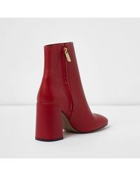 red block heel ankle boots