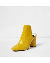 yellow block heel mules