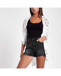 distressed high waisted black shorts