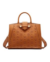 essential tote in monogram leather