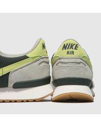 nike light green air vortex trainers