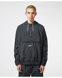 swoosh woven half zip jacket