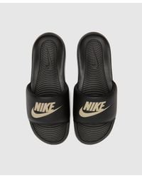 black nike slides