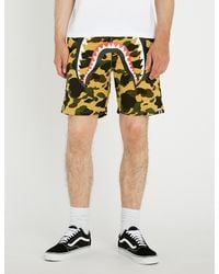 bape yellow camo shorts