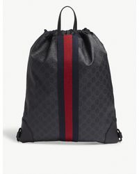 gucci supreme drawstring backpack