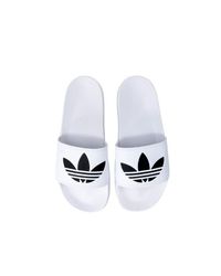 adidas Slip-ons for Men - Up to 43% off at Lyst.com