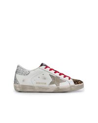 Golden goose hotsell sneakers red laces