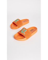 orange fenty slides