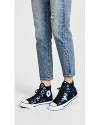 black sequin converse high tops