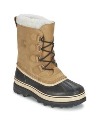 Sorel Leer Snowboots Caribou in het Bruin voor heren - Lyst