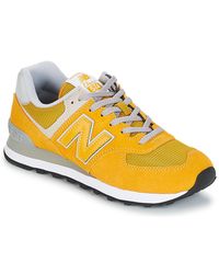 ML574 femmes Chaussures en jaune New Balance en coloris Jaune - Lyst ML574 femmes Chaussures en jaune New Balance en coloris Jaune - Lyst