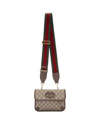 Gucci Canvas Brown Totem Gg Supreme Pouch Bag Lyst