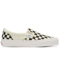 white and off white checkerboard vans