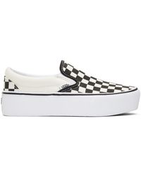 black and off white checkered vans