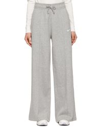 Nike Wide-leg and palazzo pants for Women - Up to 46% off at Lyst.com