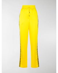 off white track pants yellow stripe