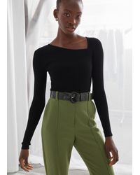 black fitted sweater