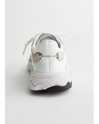 adidas ozweego other stories