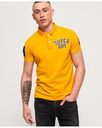 superdry yellow polo shirt