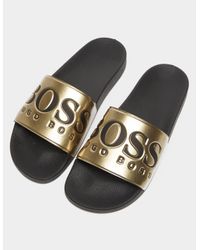 black and gold boss sliders