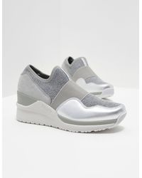 dkny leigh wedge trainer