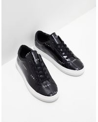 dkny black trainers womens