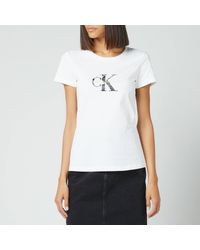 Calvin Klein Tops for Women - Up to 75% off at Lyst.com