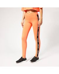 Ivy Park Orange V Active Logo Elastic Tape Tights