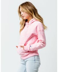 champion reverse weave allover logo pink hoodie