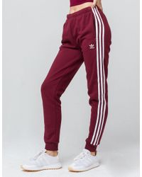 womens red adidas joggers