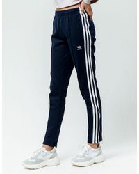 dark blue adidas pants