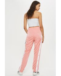 adibreak track pants pink