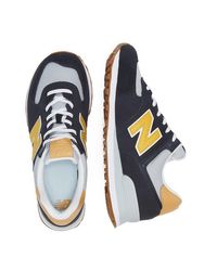 new balance 574 navy and yellow