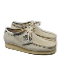 white wallabees shoes