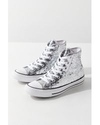 silver sparkly high top converse