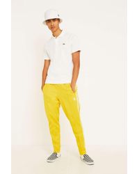 adidas beckenbauer yellow pants