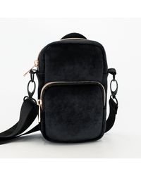 https://cdna.lystit.com/200/250/n/photos/verishop/e312631f/mytagalongs-Vixen-Black-Mini-Convertible-Crossbody-Bag.jpeg