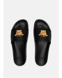 Versace Flip-flops and slides for Women - Up to 36% off at Lyst.com