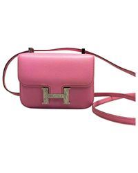 Hermès Pre-owned Constance Leather Crossbody Bag in Pink - Lyst