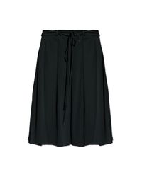LACOSTE RUNWAY Black Skirt With Slits