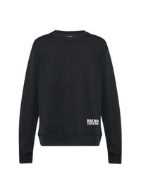 Balmain Black Sweatpants With Printed Logo for men