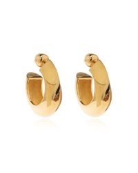 Alaïa Metallic Brass Earrings