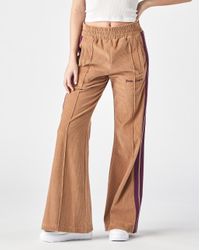 palm angels flared track pants