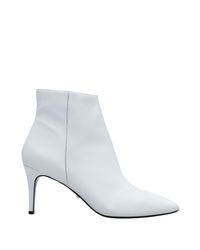 dune white ankle boots