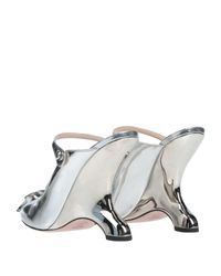 silver prada mules