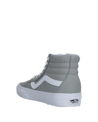 grey and black high top vans