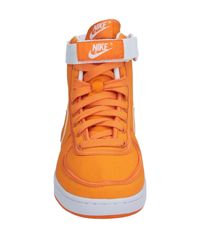 nike high tops orange and blue