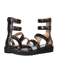 stuart weitzman gala lift studded leather gladiator sandals