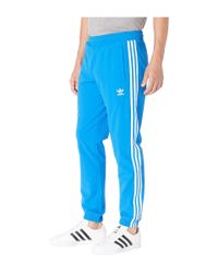 Adidas Originals Synthetic Warm Up Track Pants Bluebird Men S Workout For Men Lyst