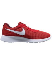 red and tan nikes